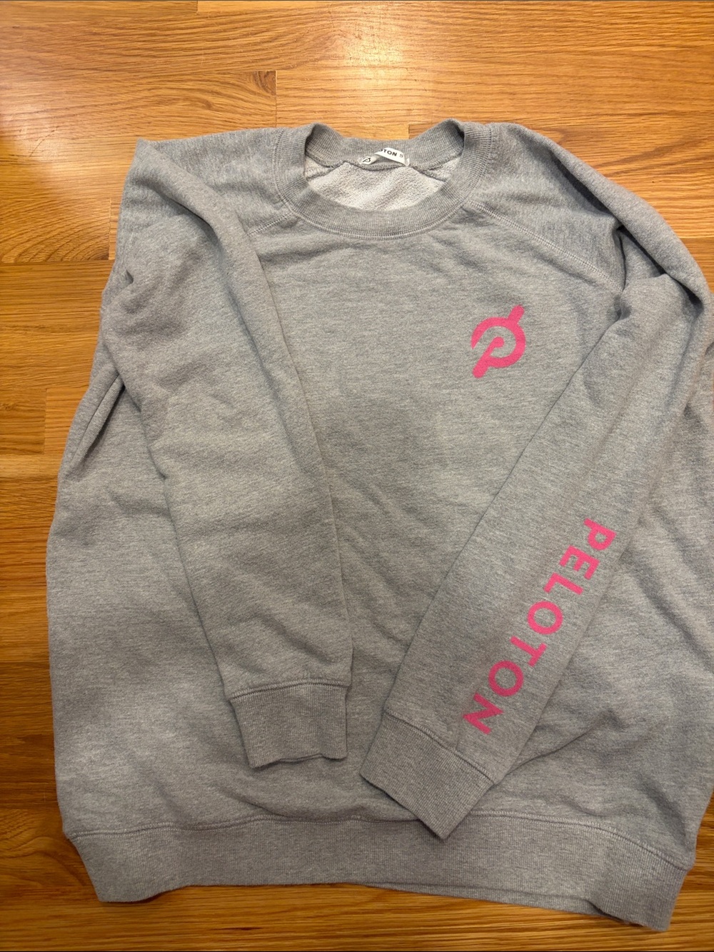 Peloton Gray Sweatshirt with Pink Logo and Sleeve Text